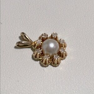 14k, cultured pearl and single cut diamond pendant .08 carat total weight .8 g